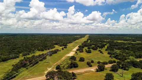 a view of a yard with an trees