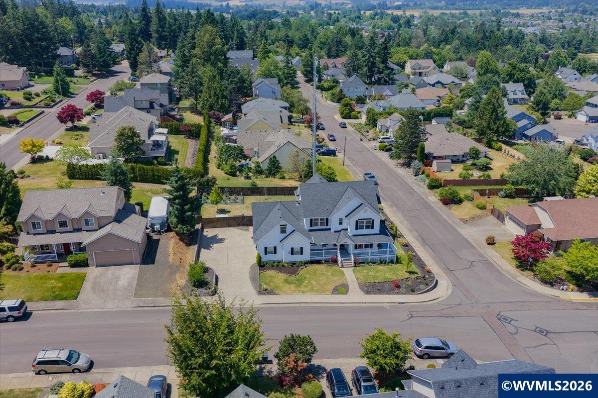 1492 Northwest Penny Lane Albany, OR 97321 - Photo 3 of 50 an aerial view of a house with a swimming pool outdoor seating and yard