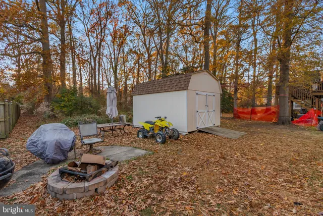 a view of a patio with chairs and tables