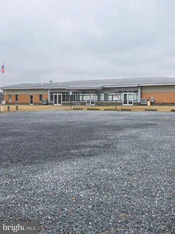 a view of outdoor space with seating area and barbeque oven