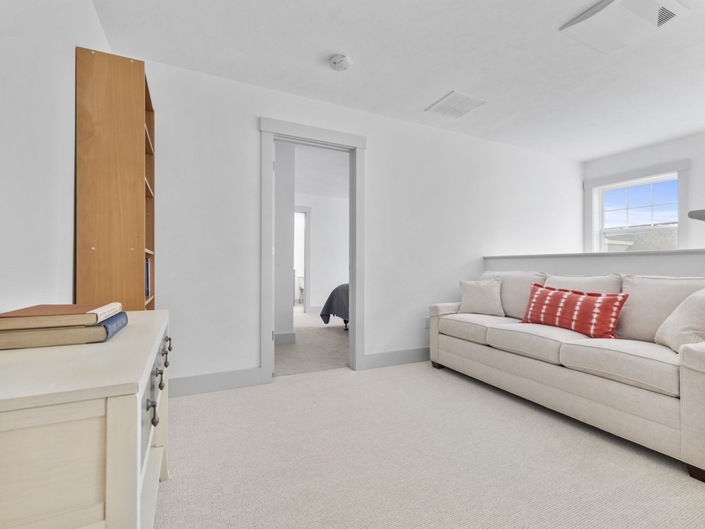 34 Lantern Way, Unit 34 Ashland, MA 01721 - Photo 19 of 30 a living room with furniture and a couch