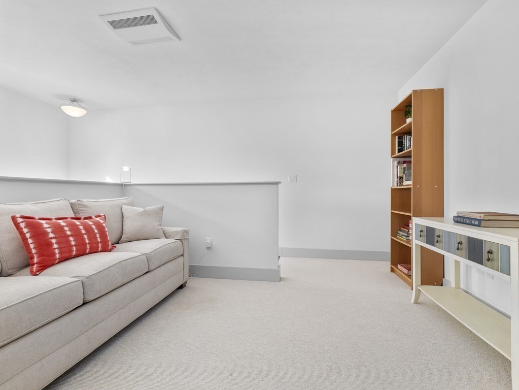 34 Lantern Way, Unit 34 Ashland, MA 01721 - Photo 20 of 30 a living room with furniture
