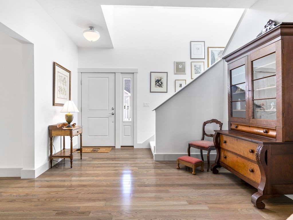 34 Lantern Way, Unit 34 Ashland, MA 01721 - Photo 2 of 30 a living room with furniture window and wooden floor