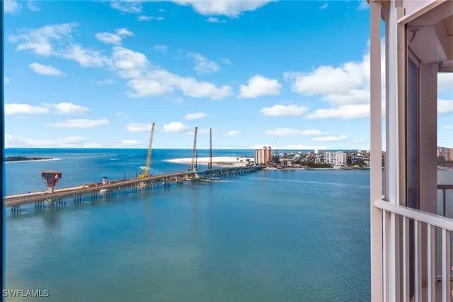 a view of an ocean with city