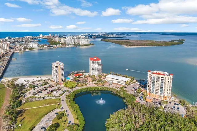 a view of a lake with building in front of it