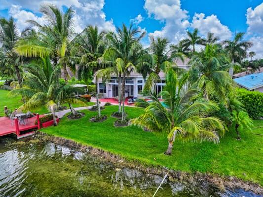 576 Northwest 120th Drive Coral Springs, FL 33071 - Photo 12 of 23 a view of a garden with a tree