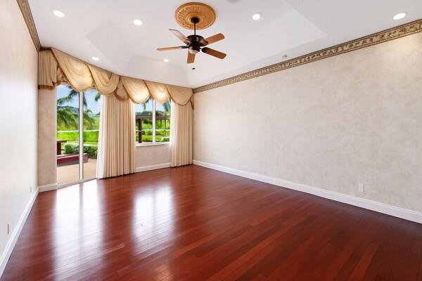 576 Northwest 120th Drive Coral Springs, FL 33071 - Photo 18 of 23 a view of an empty room with a window and wooden floor