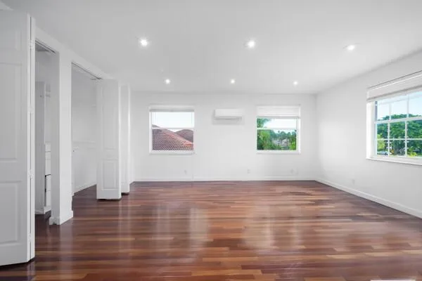 a view of a house with a yard and sitting area