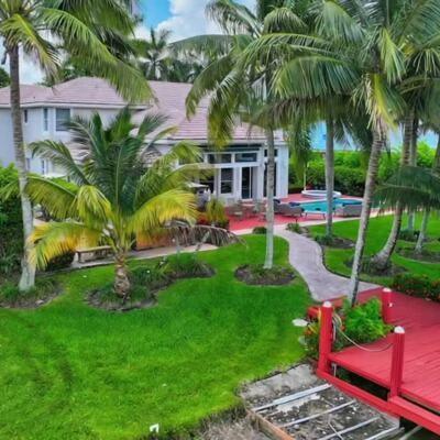 576 Northwest 120th Drive Coral Springs, FL 33071 - Photo 22 of 23 a view of a house with a yard and sitting area
