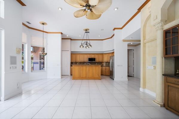 576 Northwest 120th Drive Coral Springs, FL 33071 - Photo 4 of 23 a view of a hallway with entryway and cabinet