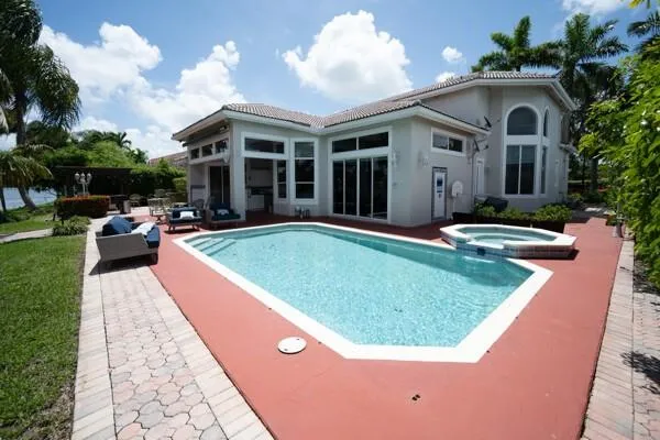 a view of outdoor space yard and swimming pool