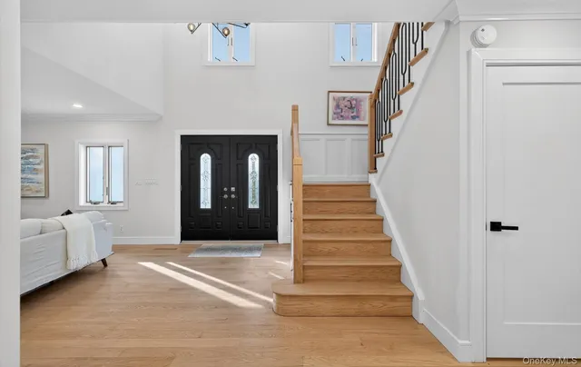 a view of an entryway with staircase