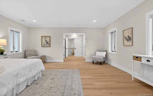 a bedroom with a bed and lamp