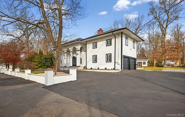 a view of a house with a street
