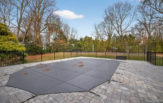 a view of a backyard of the house