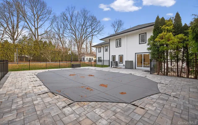 a view of backyard with green space