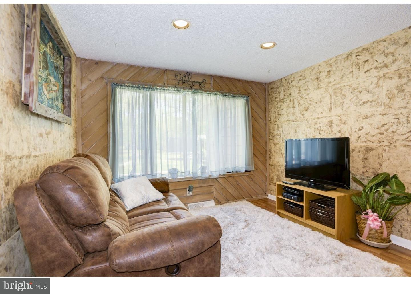 7 Lake Road Tabernacle, NJ 08088 - Photo 9 of 25 a living room with furniture and a flat screen tv