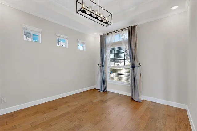 a view of a room that has a bed and a window