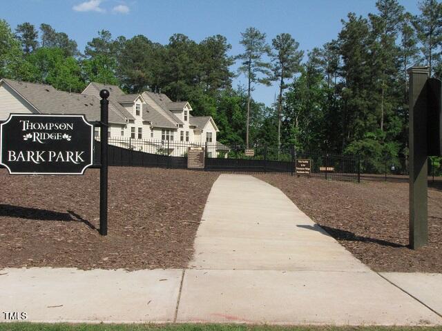 58 Pocono Drive Durham, NC 27705 - Photo 19 of 22 a view of a street with benches in the background