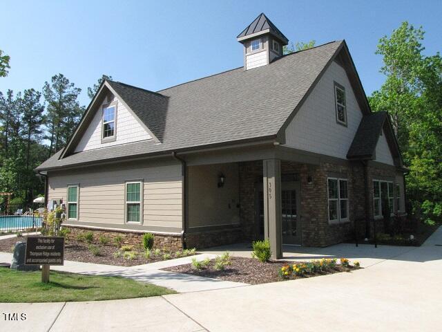 58 Pocono Drive Durham, NC 27705 - Photo 22 of 22 a front view of a house with garden