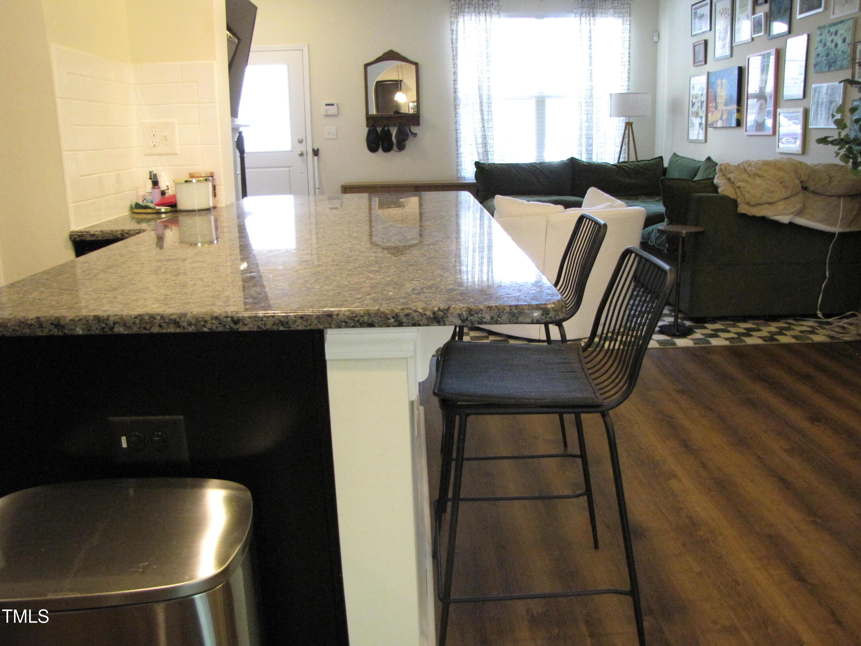 58 Pocono Drive Durham, NC 27705 - Photo 8 of 22 a kitchen with a table and chairs