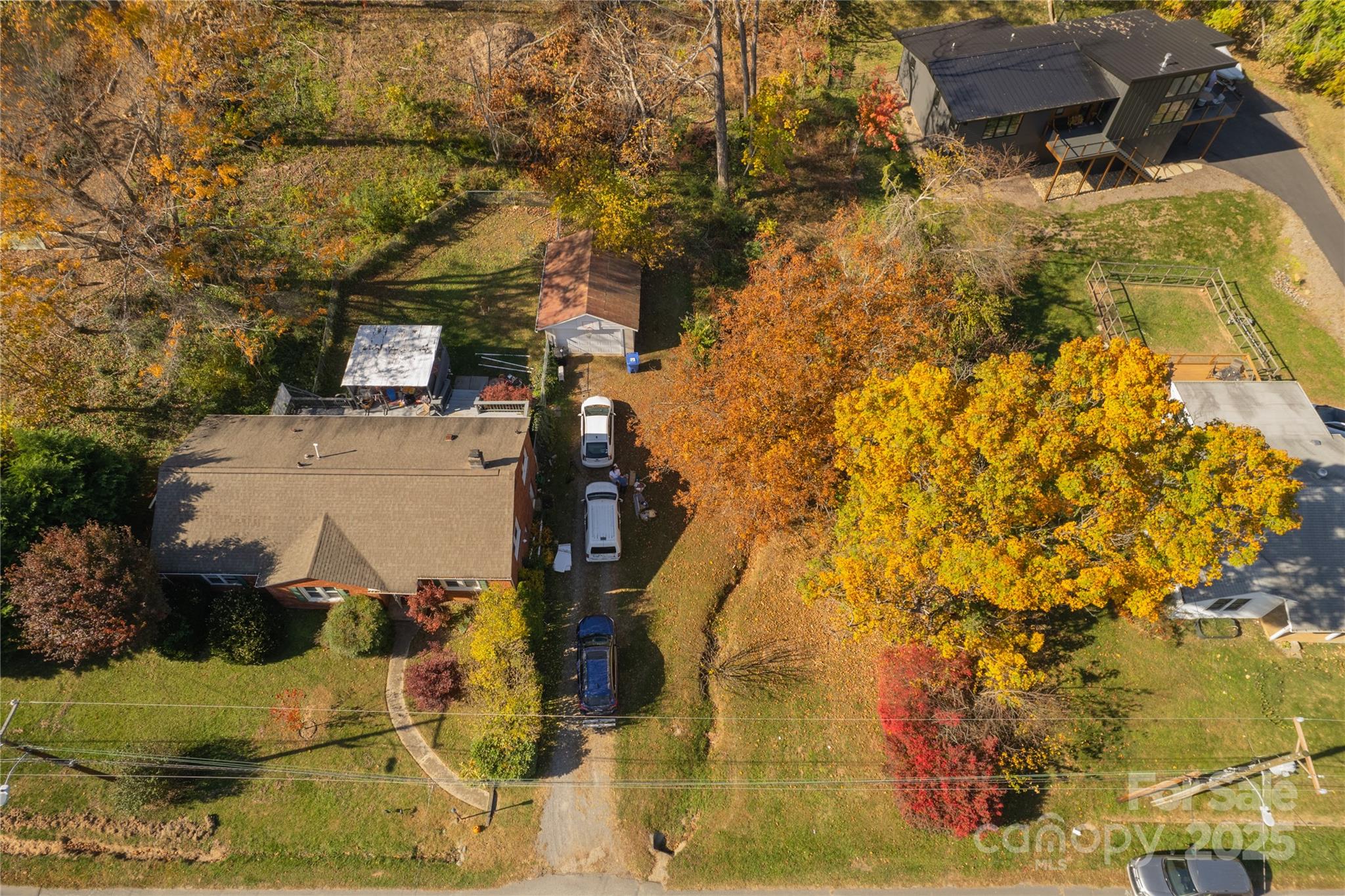 13 Bassett Road Asheville, NC 28804 - Photo 15 of 16 an aerial view of residential houses with outdoor space