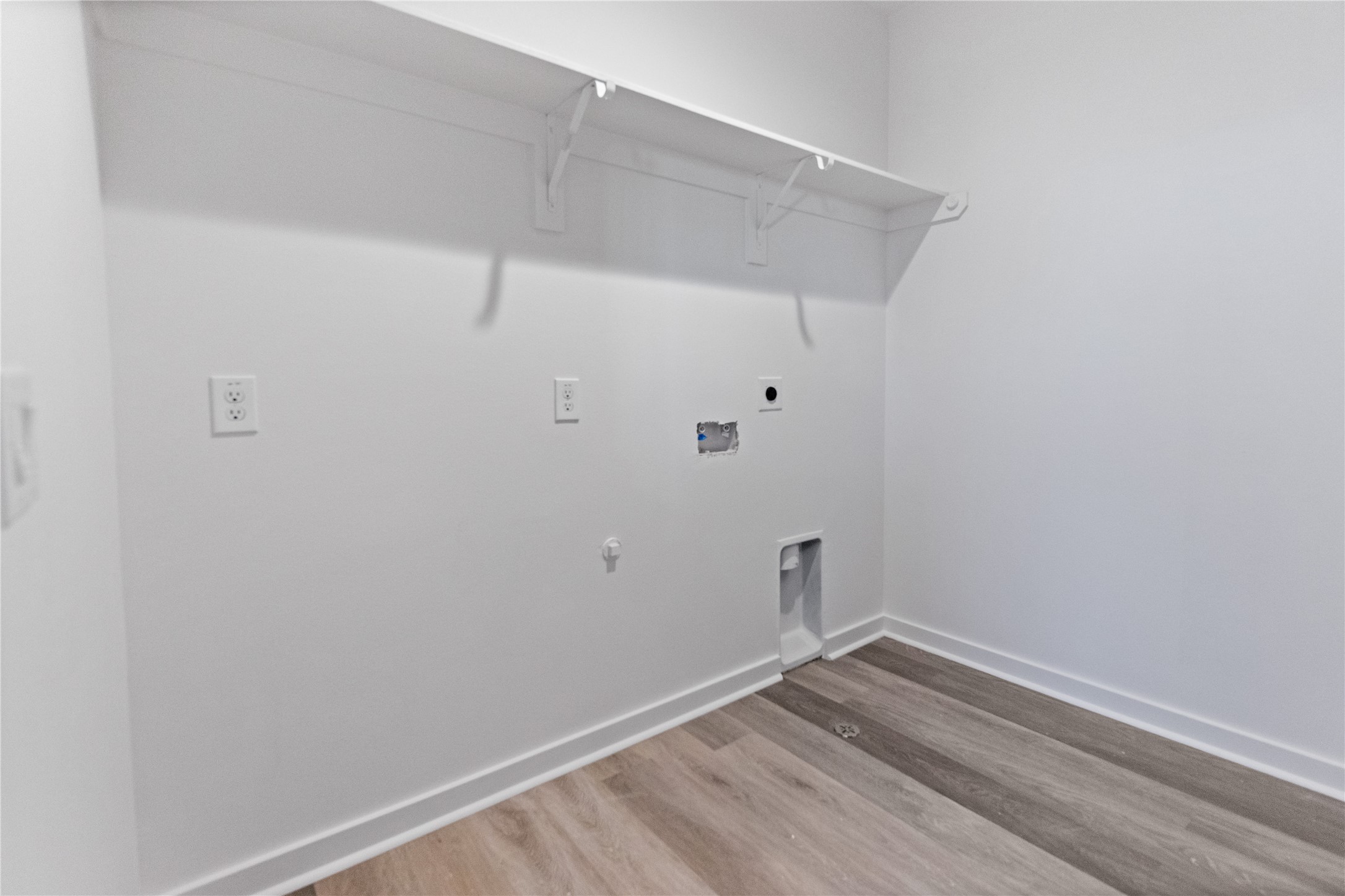 2702 Winbern Street, Unit B Houston, TX 77004 - Photo 11 of 12 Utility Room with electric Dryer and Washer connections
