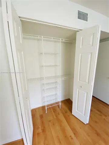 a view of a livingroom with a ceiling fan