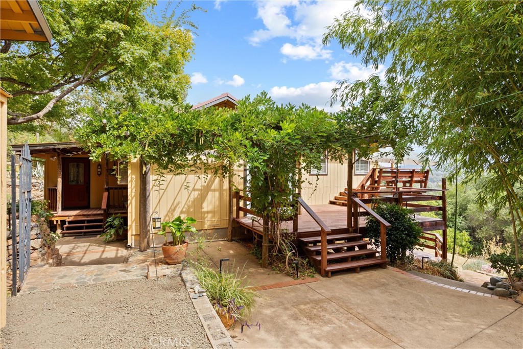 a view of a bench in front of a house