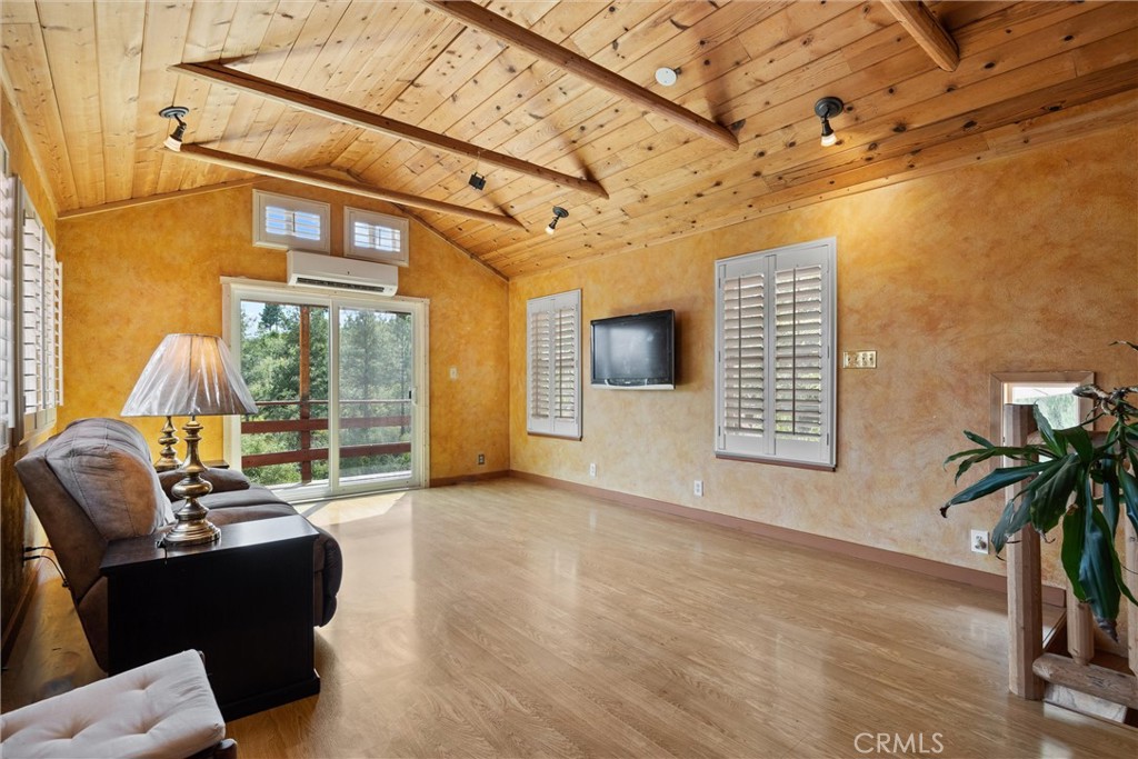 10294 Red Eye Road Oroville, CA 95965 - Photo 14 of 62 a living room with furniture and a floor to ceiling window