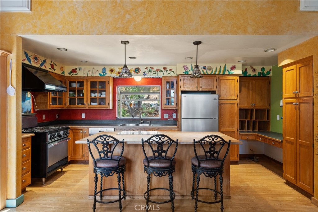 10294 Red Eye Road Oroville, CA 95965 - Photo 16 of 62 a view of a dining room with furniture and chandelier