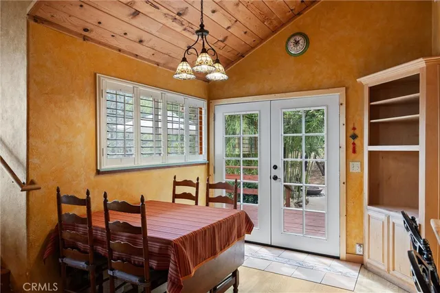 a bathroom with a sink a mirror and a shower