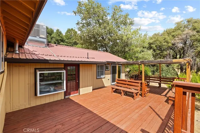 a view of a livingroom with furniture and a window