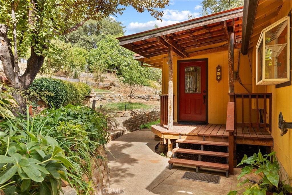 10294 Red Eye Road Oroville, CA 95965 - Photo 10 of 62 a front view of a house with a yard