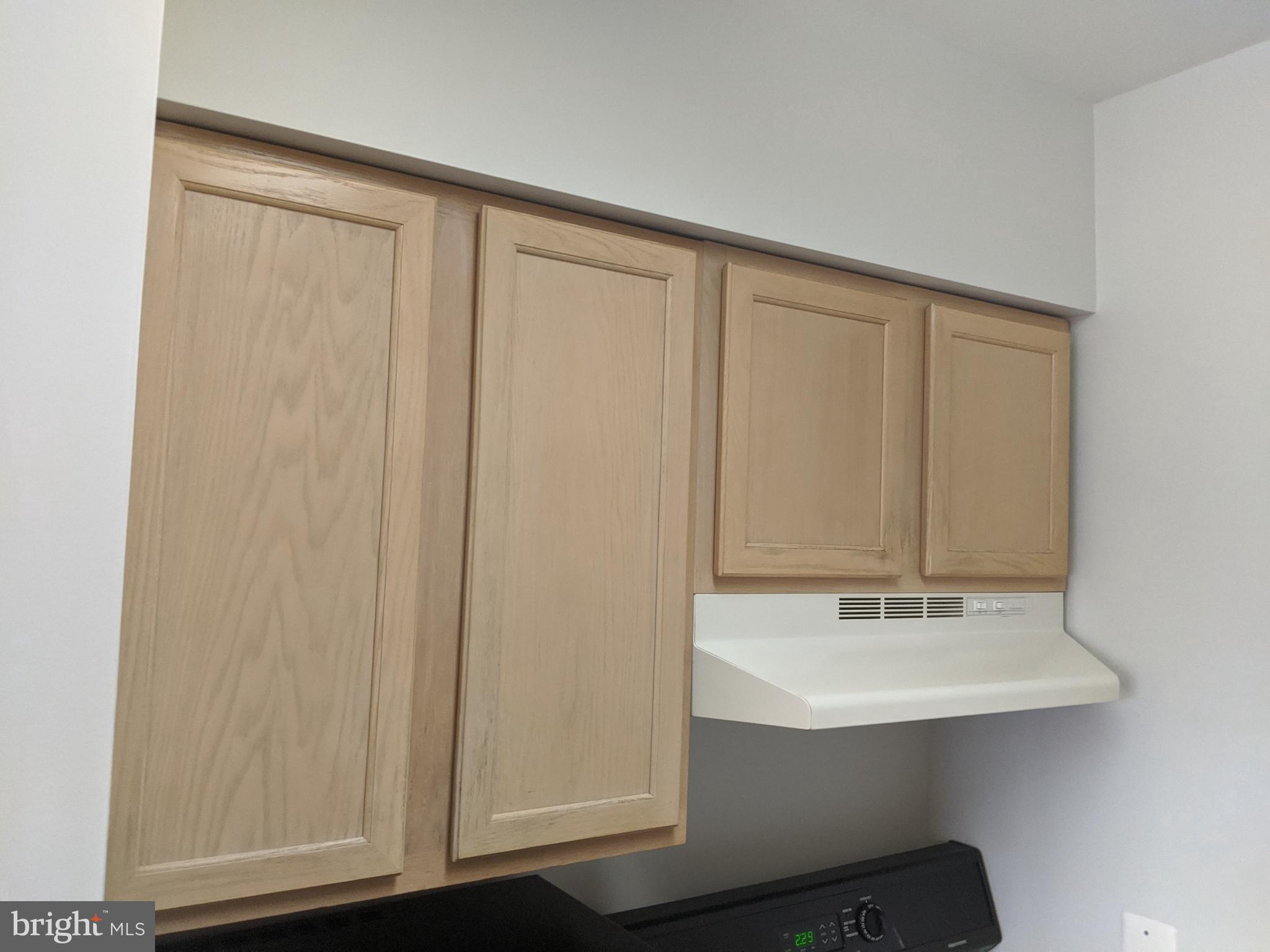 635 Waterloo Road, Unit 231 Warrenton, VA 20186 - Photo 14 of 32 Modern kitchen with sleek cabinetry.