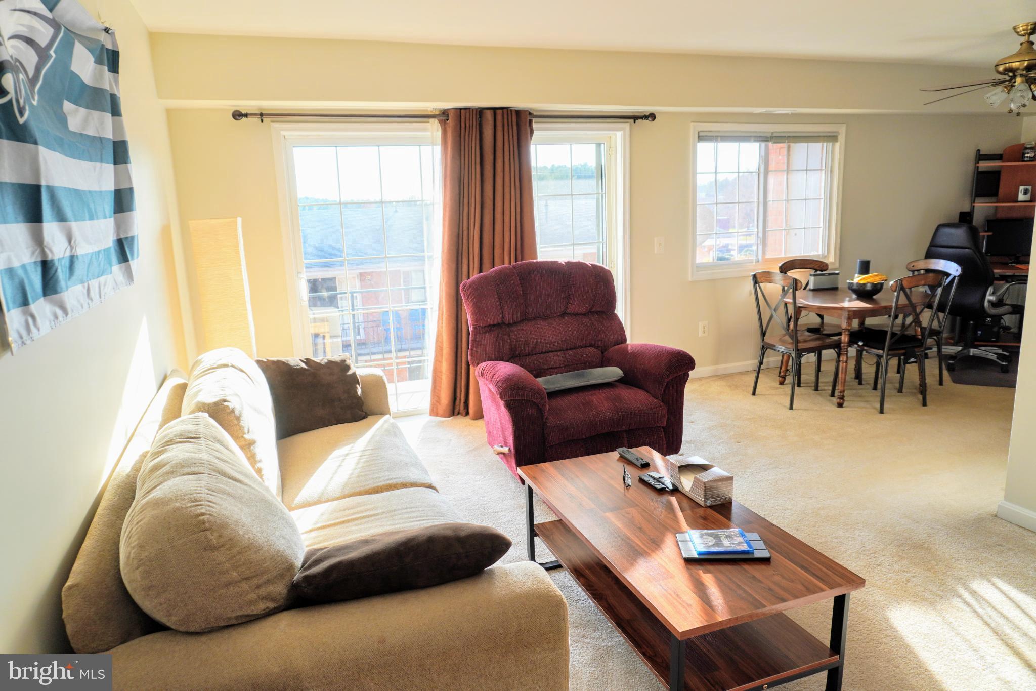 635 Waterloo Road, Unit 231 Warrenton, VA 20186 - Photo 2 of 32 Bright and inviting living space with charm.