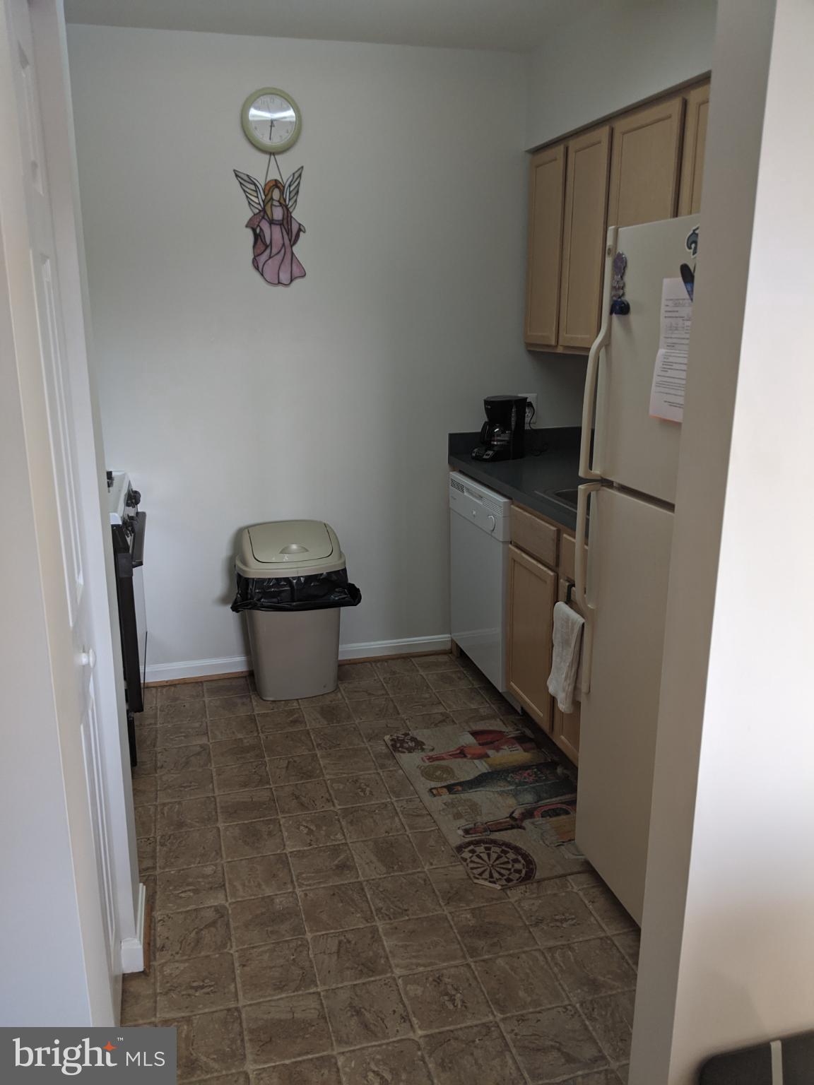 635 Waterloo Road, Unit 231 Warrenton, VA 20186 - Photo 21 of 32 Cozy kitchen with inviting charm.