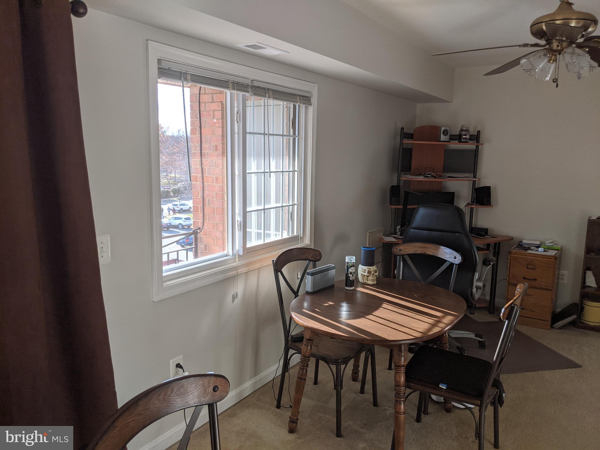 635 Waterloo Road, Unit 231 Warrenton, VA 20186 - Photo 24 of 32 Bright and inviting workspace with natural light.