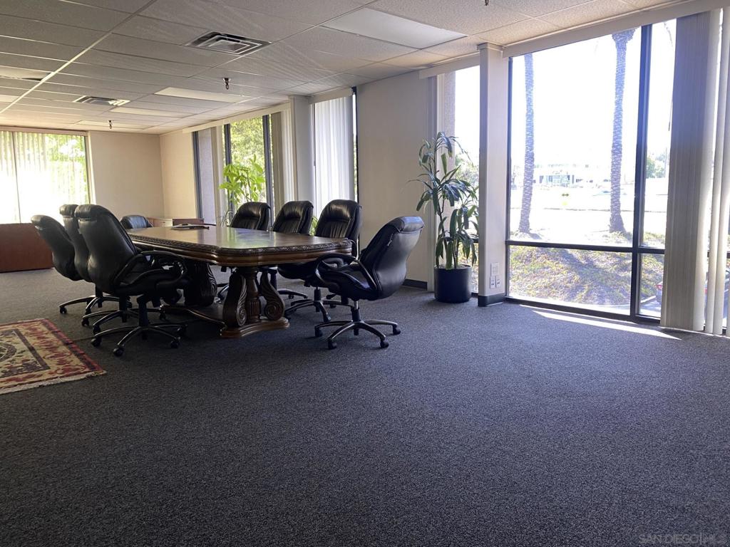 330 Rancheros Drive, Unit 258 San Marcos, CA 92069 - Photo 12 of 18 a view of a livingroom with workspace and a window