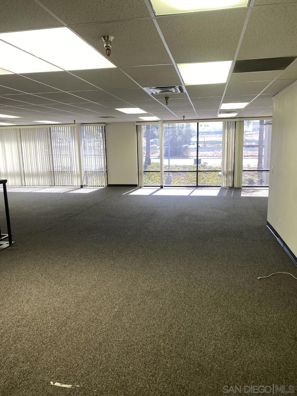 330 Rancheros Drive, Unit 258 San Marcos, CA 92069 - Photo 15 of 18 a view of an empty room with a window