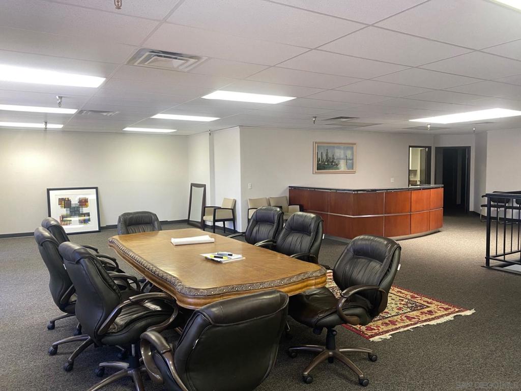 330 Rancheros Drive, Unit 258 San Marcos, CA 92069 - Photo 4 of 18 a view of a dining room with furniture