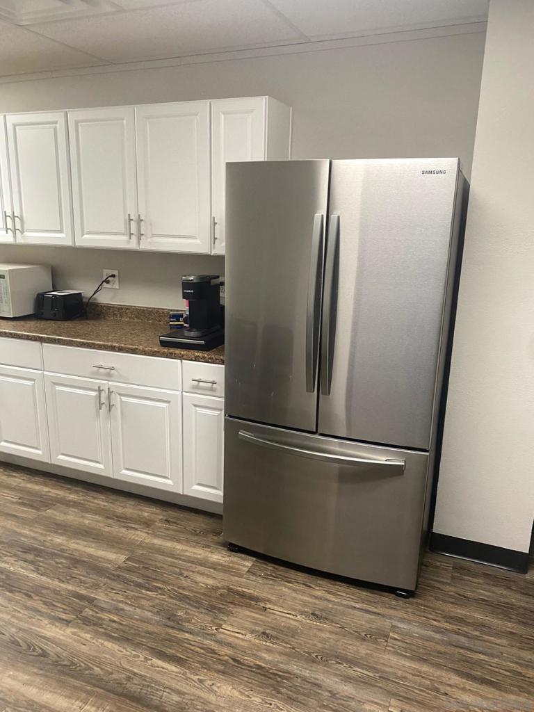 330 Rancheros Drive, Unit 258 San Marcos, CA 92069 - Photo 6 of 18 a white refrigerator freezer sitting in a kitchen