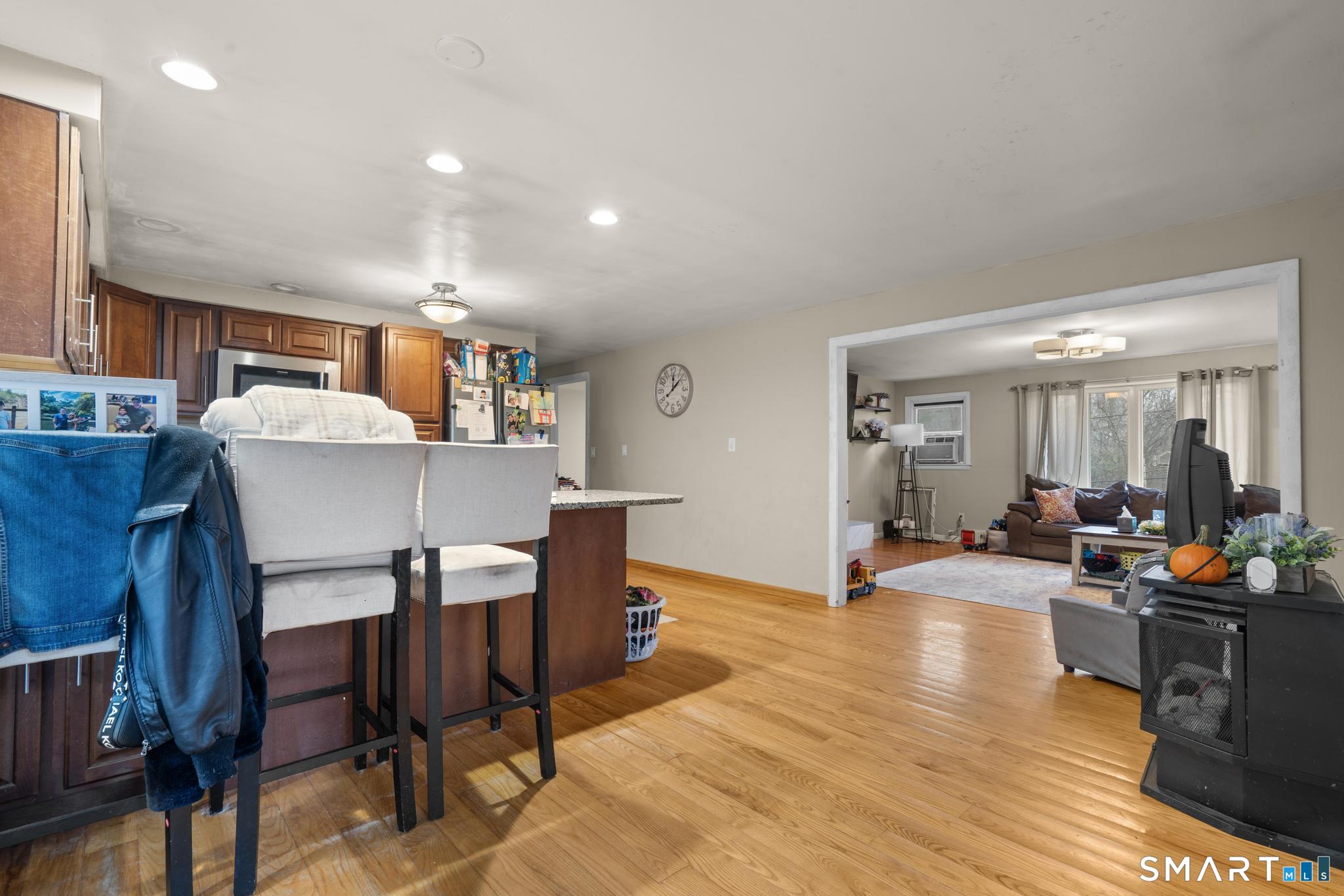 523 Chamberlain Hill Road Haddam, CT 06441 - Photo 2 of 40 a living room with furniture and wooden floor