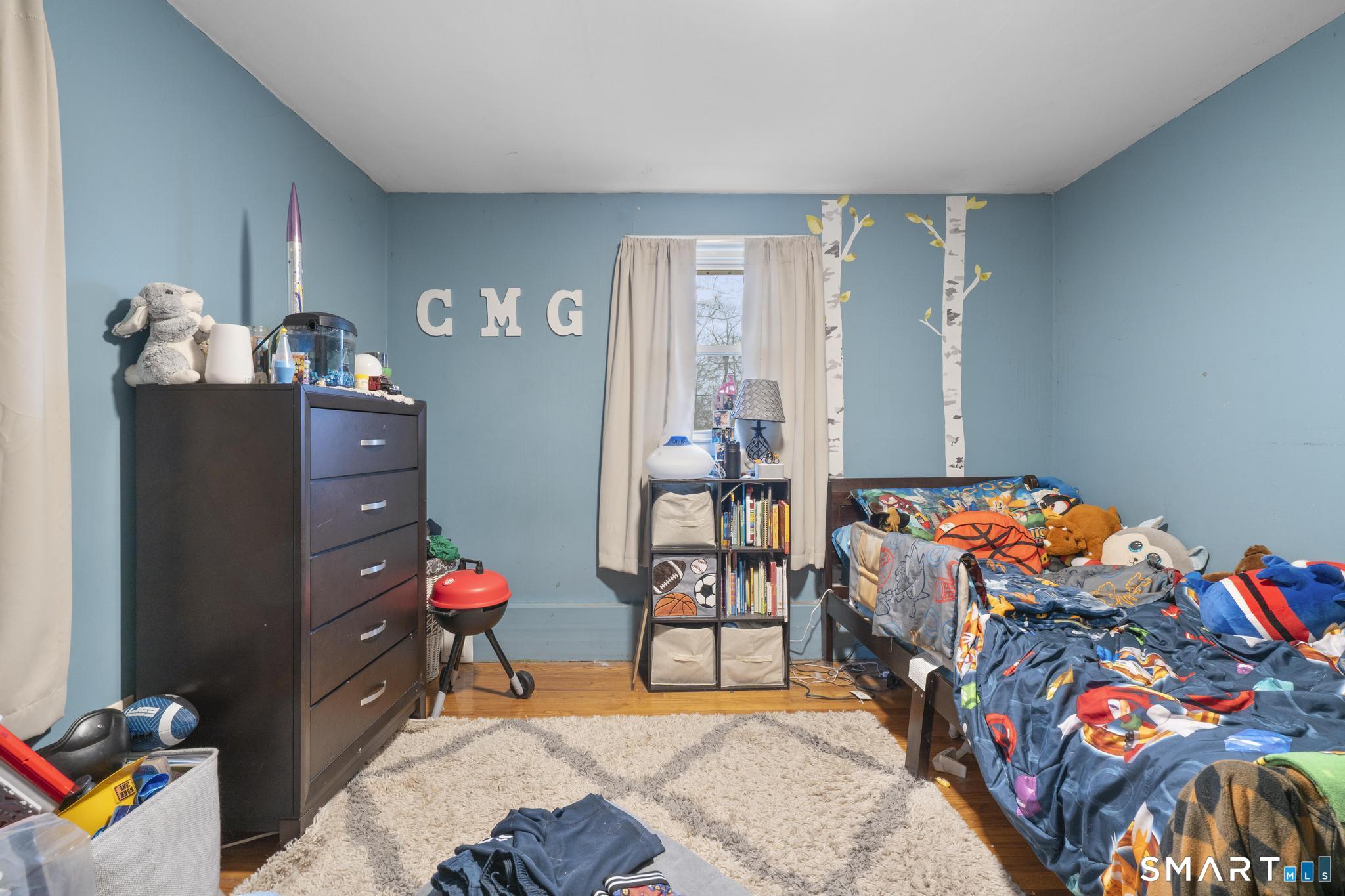 523 Chamberlain Hill Road Haddam, CT 06441 - Photo 29 of 40 a living room with furniture and a couch