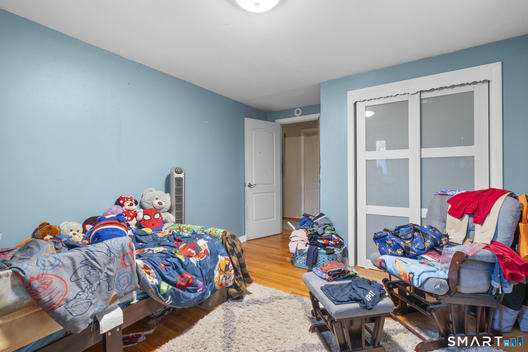 523 Chamberlain Hill Road Haddam, CT 06441 - Photo 30 of 40 a bedroom with furniture and a bed