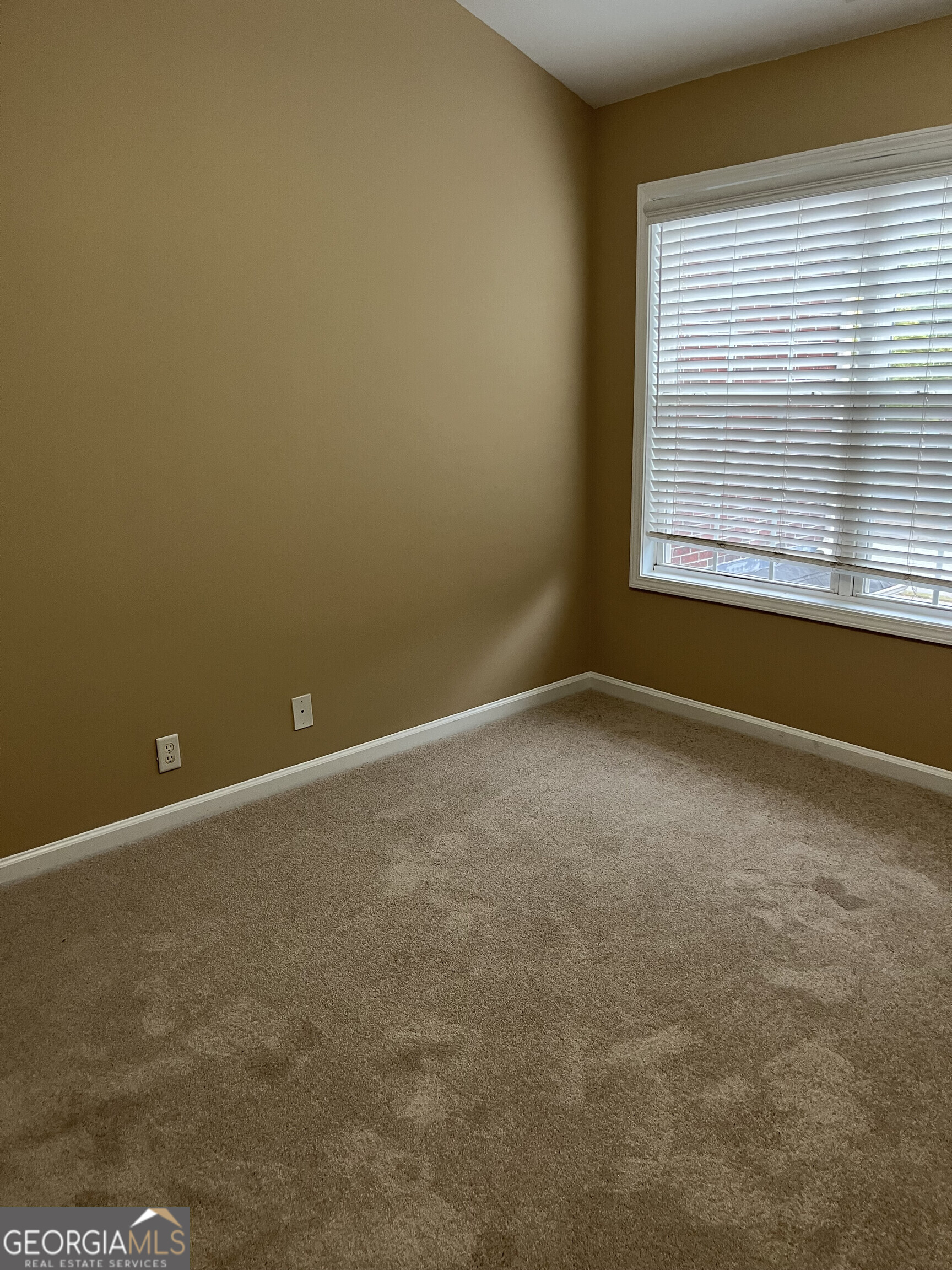 112 Granite Way Newnan, GA 30265 - Photo 13 of 22 an empty room with a window