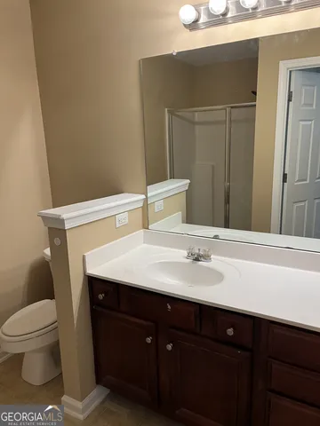 a bathroom with a sink and a vanity