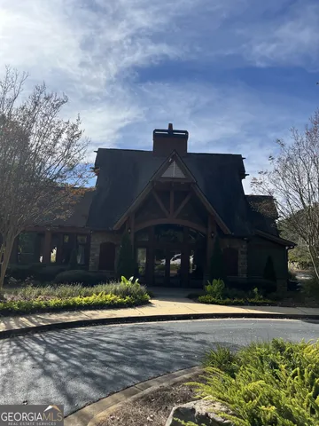 a view of a yard with trees