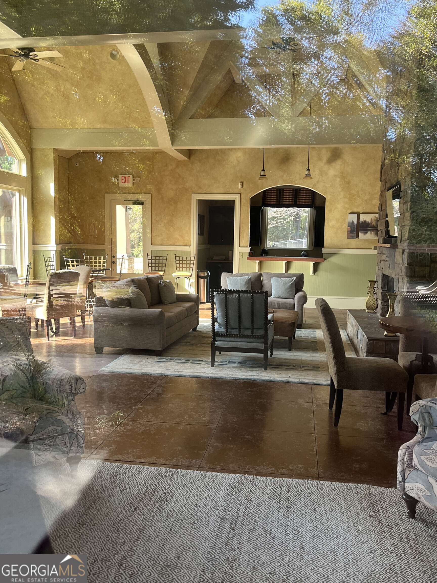 112 Granite Way Newnan, GA 30265 - Photo 17 of 22 a living room with furniture and a flat screen tv