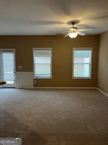 a kitchen with a sink and a stove